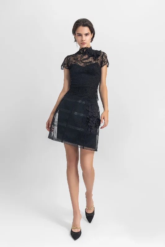 High-neckline lace top, paired with a cage-like skirt with flower details on the side ruffled skirt detail